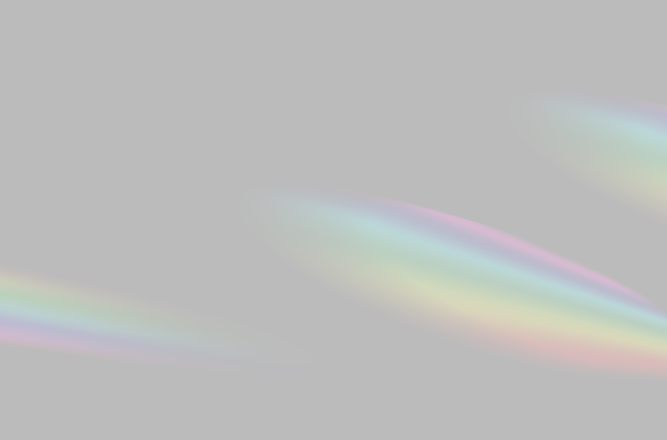 Blurred Rainbow Prism Light Overlay on Grey Background 